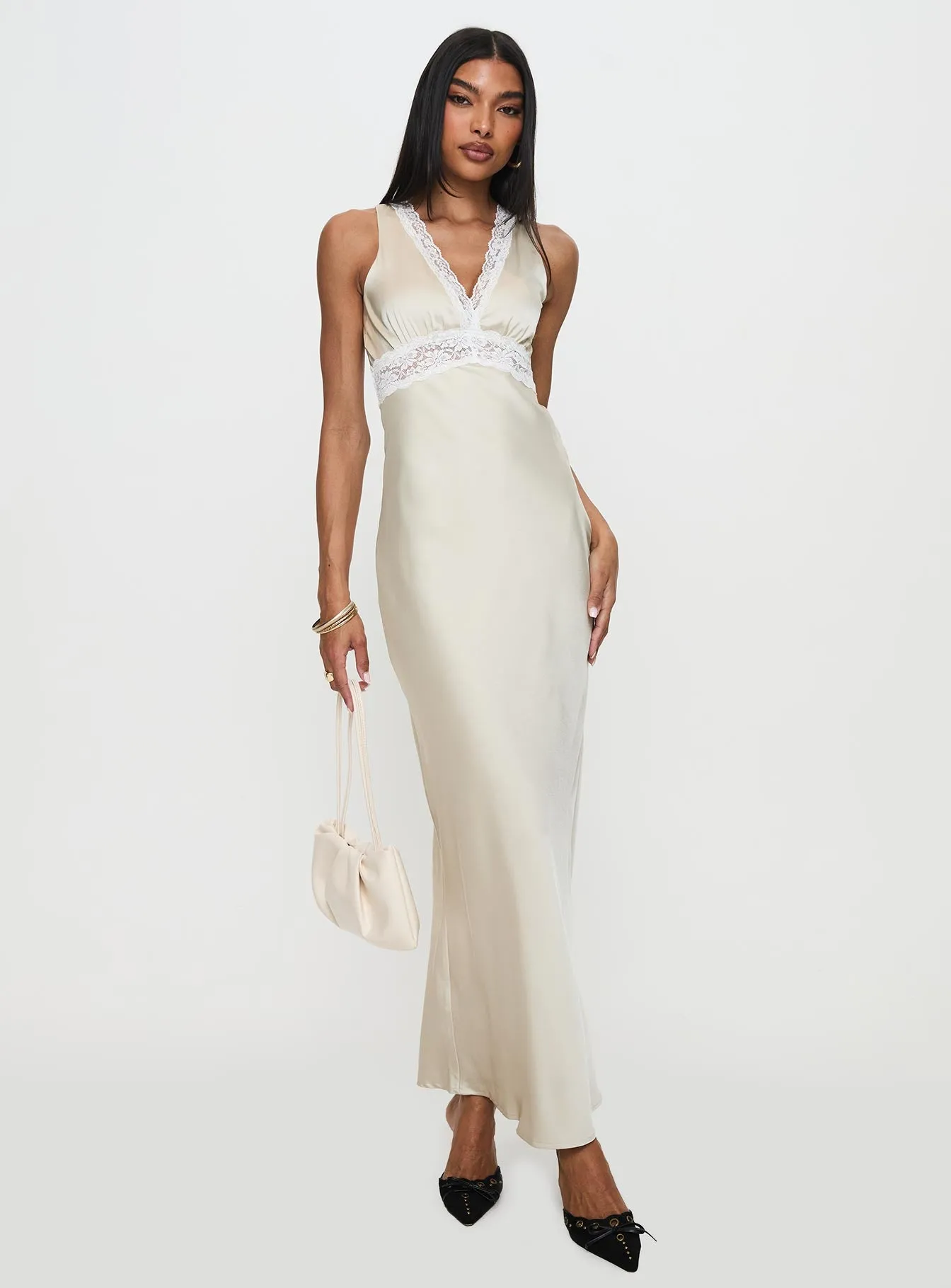 This dress offers a flattering shape that can easily be accessorized for a variety of looks garden party Persefonie Lace Maxi Dress Champagne