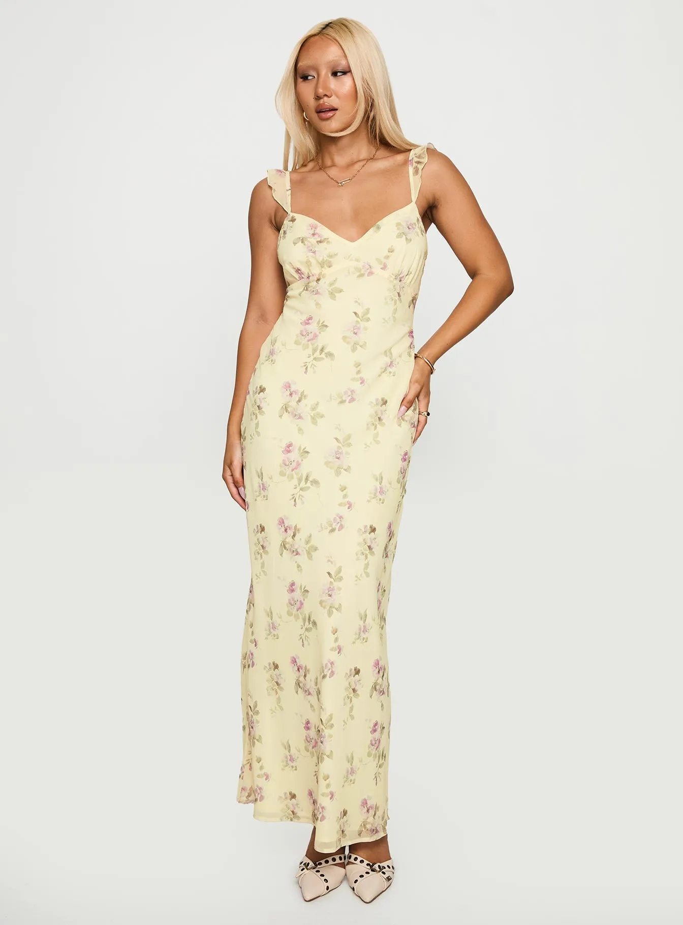Perfect for layering with jackets or sweaters this maxi dress works for year-round wear Xaverie Maxi Dress Floral