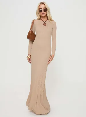 Carlota Long Sleeve Maxi Dress Beige This dress is designed to keep you comfortable while maintaining a stylish and polished appearance Designed to suit all body types this dress provides a flattering fit for every figure