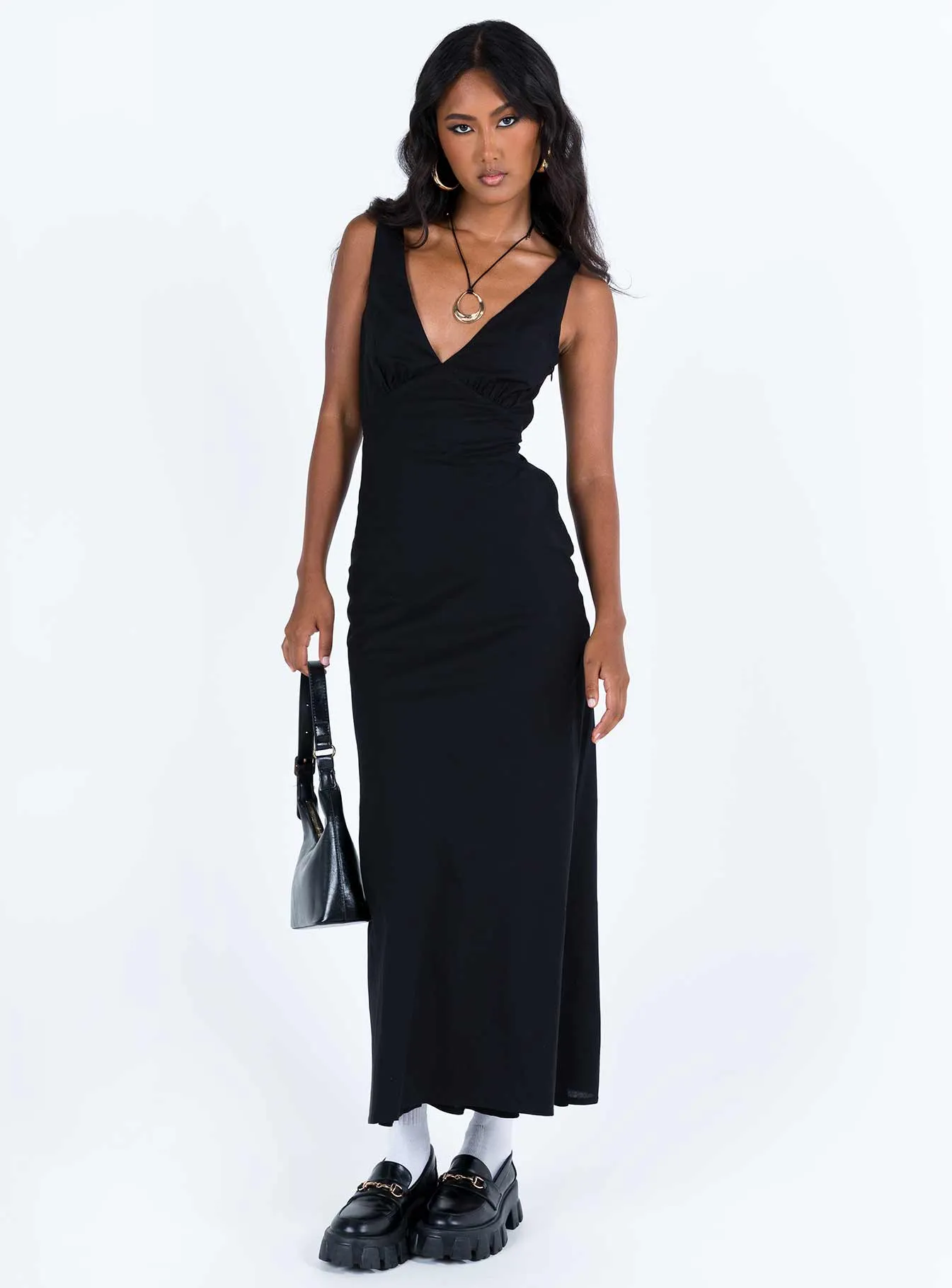 Nellie Maxi Dress Black Linen Stone Path The easy-to-wear design of this maxi dress ensures that you can style it effortlessly