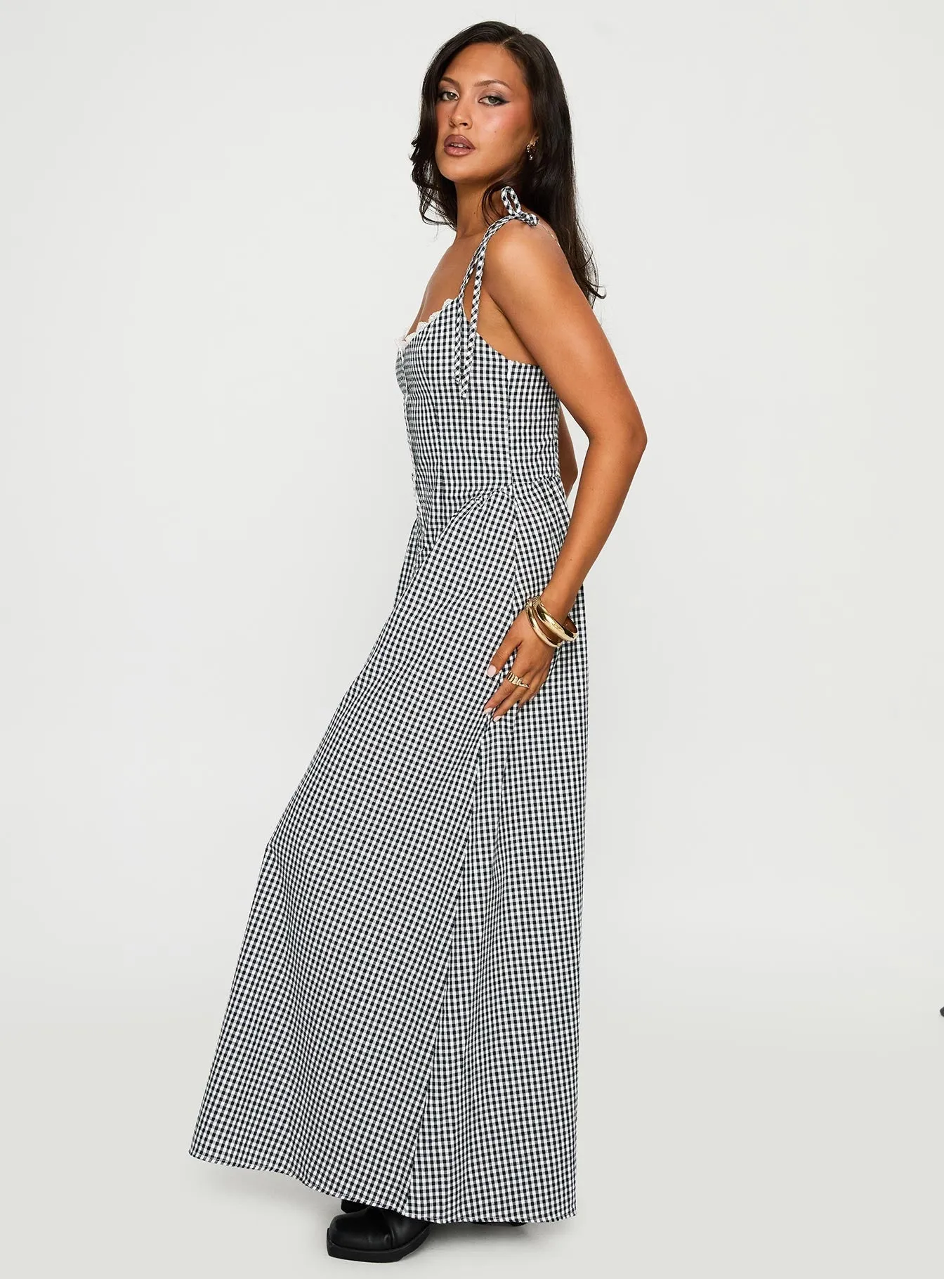 This dress works effortlessly for a variety of events providing both comfort and style Petal Path Dalanie Tie Strap Maxi Dress Navy Gingham