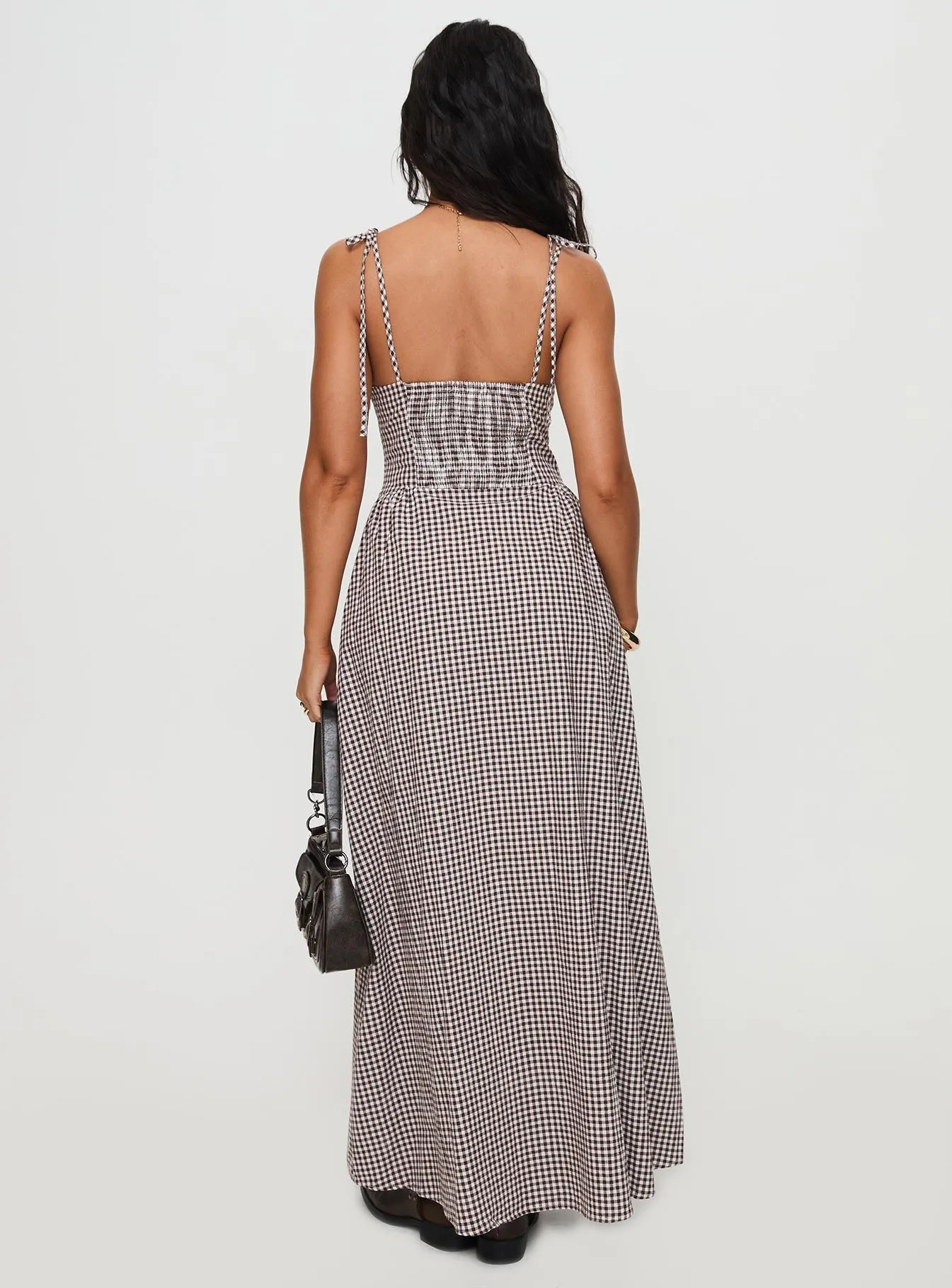 The simple design of this dress ensures that it will never go out of style Dalanie Tie Strap Maxi Dress Brown Gingham Petite