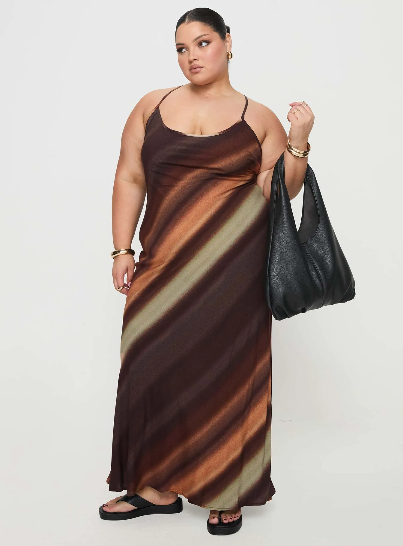 Otillie Maxi Dress Brown Multi Curve Sunset Glow This maxi dress combines a relaxed fit with an elegant look for a versatile wardrobe piece