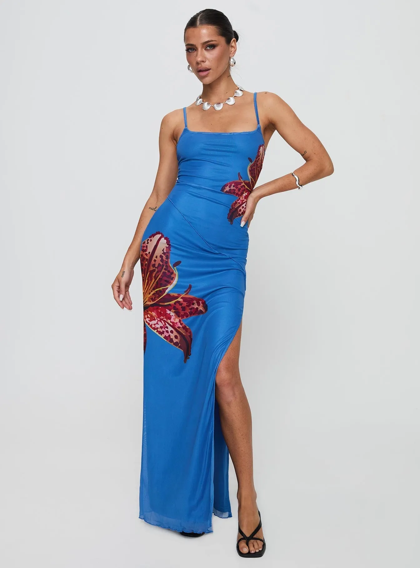 Perfect for warmer months this dress provides a light and breezy fit without sacrificing style Patch Work Bespoke Maxi Dress Blue