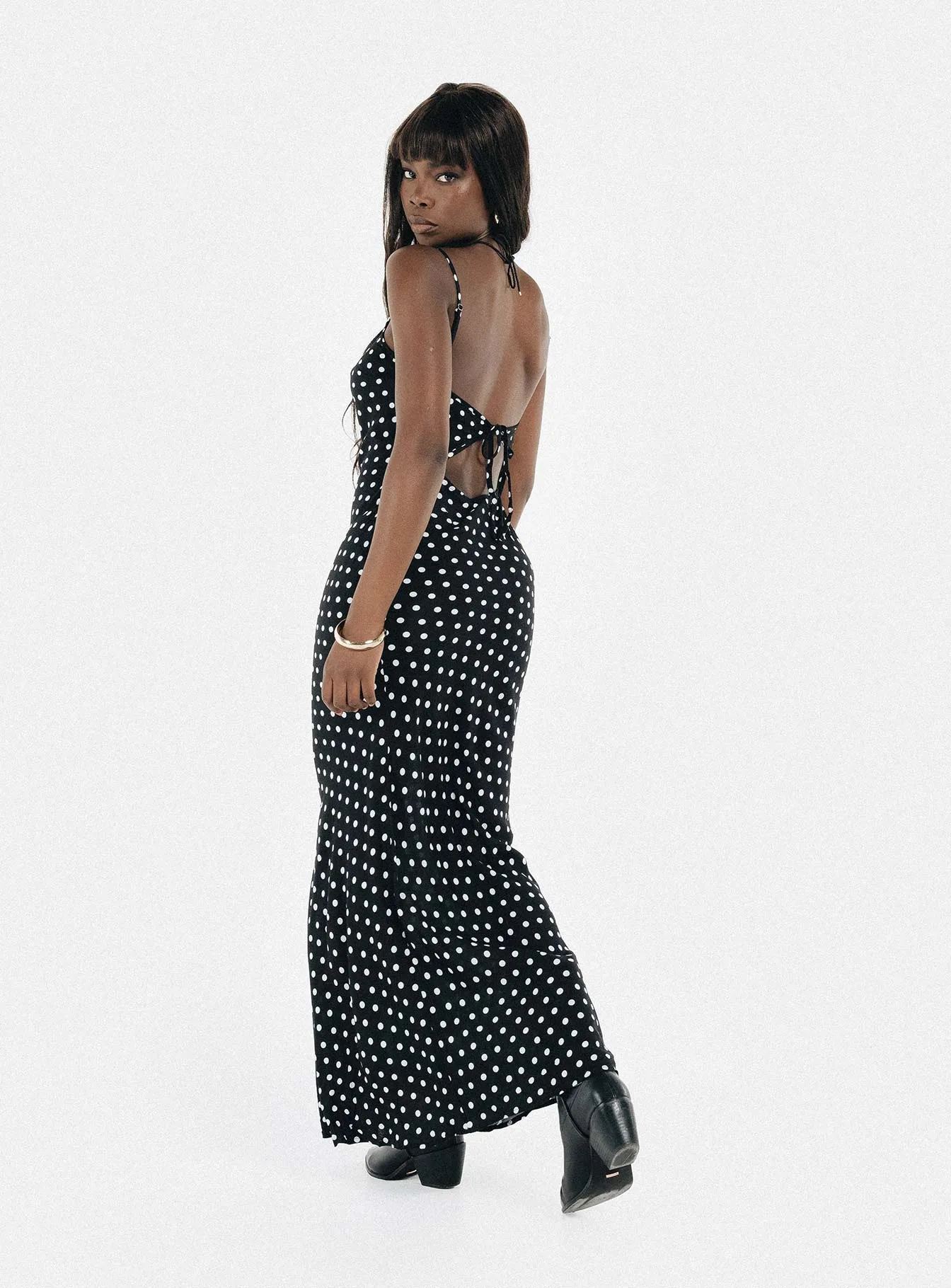 This dress provides the ideal balance of style and comfort making it a wardrobe essential Luncheon Maxi Dress Black Polka Dot