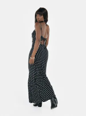 This dress provides the ideal balance of style and comfort making it a wardrobe essential Luncheon Maxi Dress Black Polka Dot