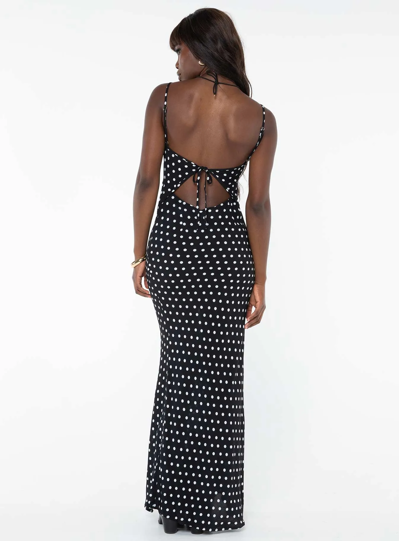 The long length of this dress creates a graceful appearance that is perfect for any occasion Luncheon Maxi Dress Black Polka Dot