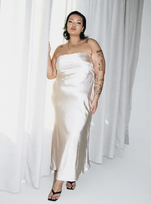 The flattering shape of this dress creates a beautiful silhouette that is perfect for all body types Bold pattern maxi Haley Maxi Dress Champagne Curve