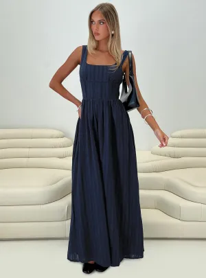 The simple silhouette of this dress makes it easy to style for both day and night wear Lorinda Maxi Dress Navy