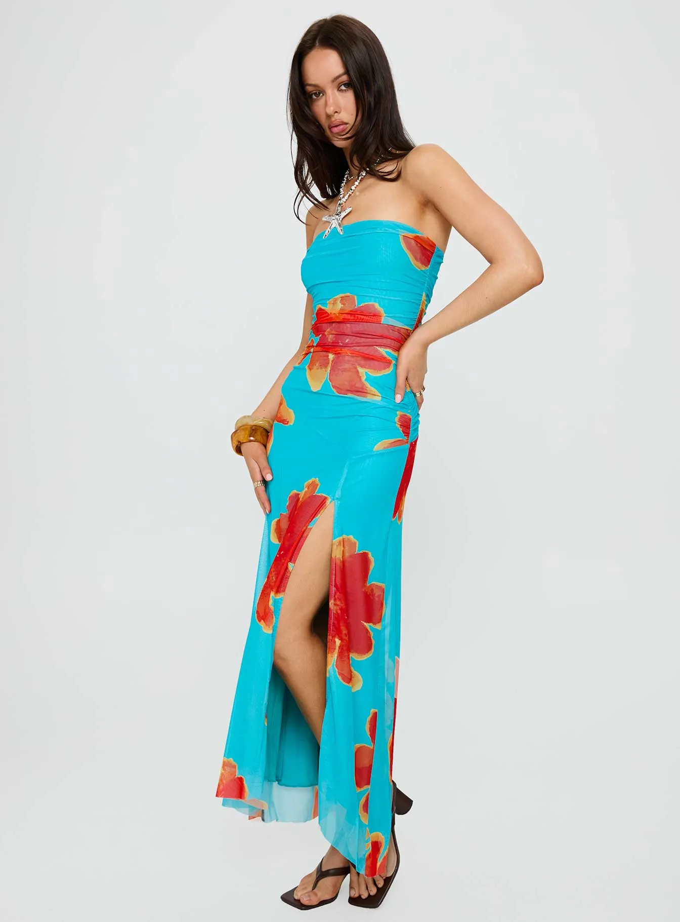 The long length of this dress provides ample coverage while remaining stylish Red Glow Katara Strapless Maxi Dress Blue / Orange Floral