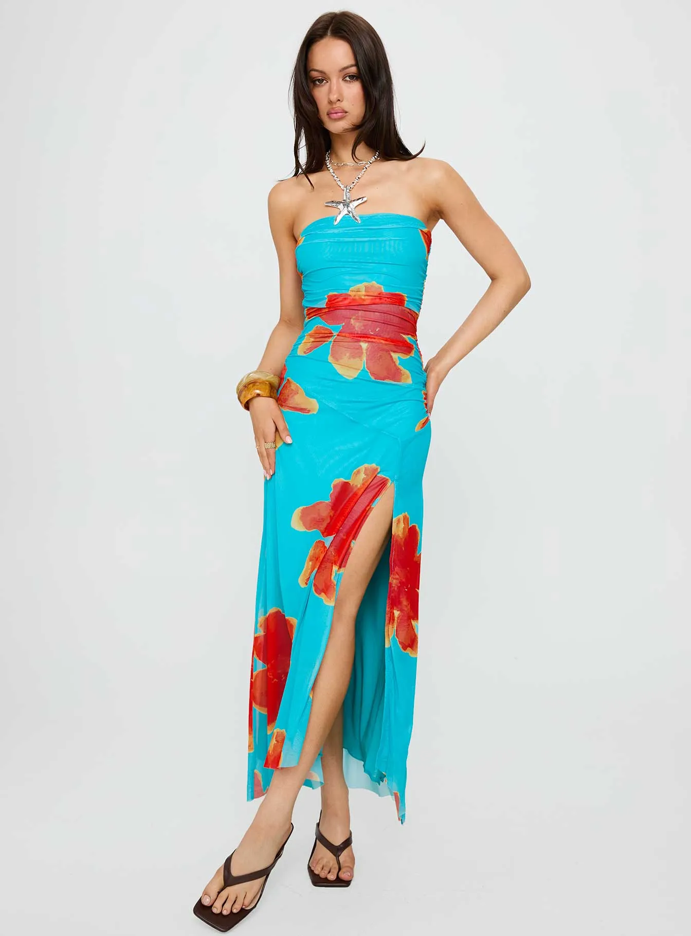 Katara Strapless Maxi Dress Blue / Orange Floral This maxi dress creates an elegant silhouette without sacrificing comfort