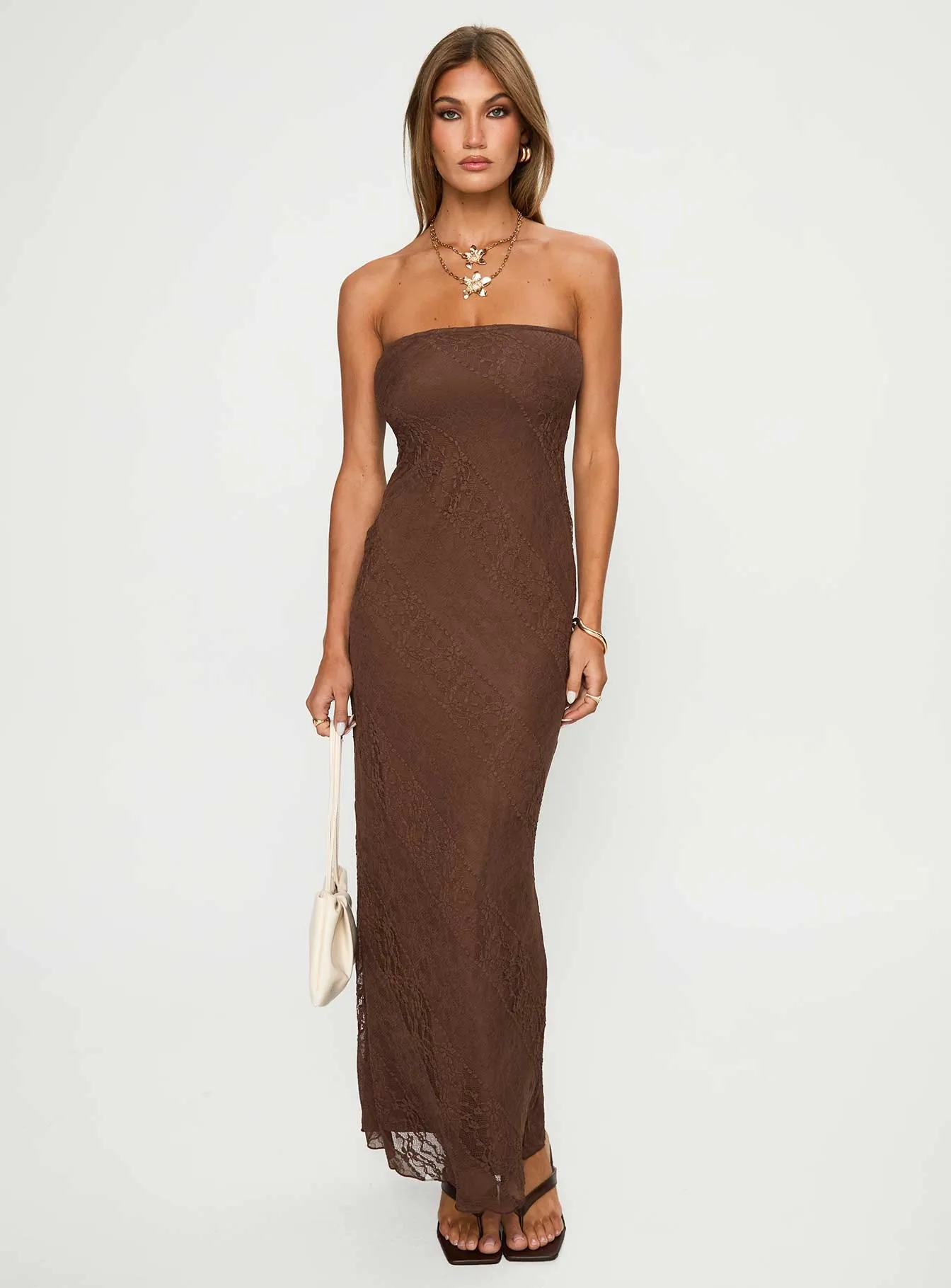 Majorca Strapless Lace Maxi Dress Chocolate This dress is designed to be worn for a variety of occasions providing effortless style Sun Heat