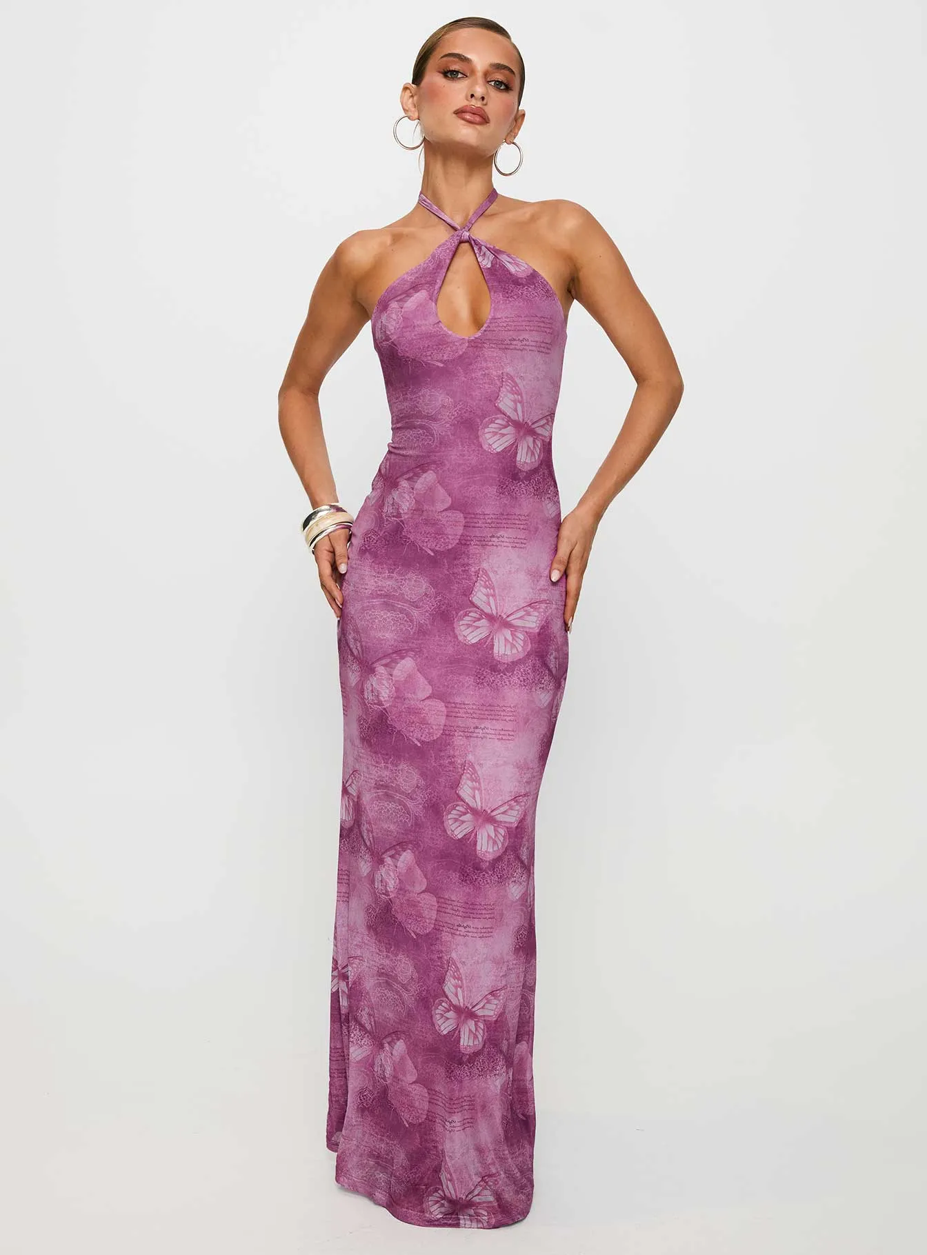 Nathaleia Halter Maxi Dress Purple The versatile nature of this maxi dress allows for a range of styling possibilities from casual to chic