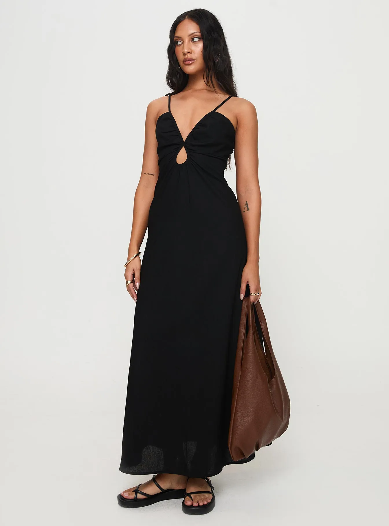 The flattering design of this dress ensures it enhances your shape while providing comfort Harkonnen Maxi Dress Black