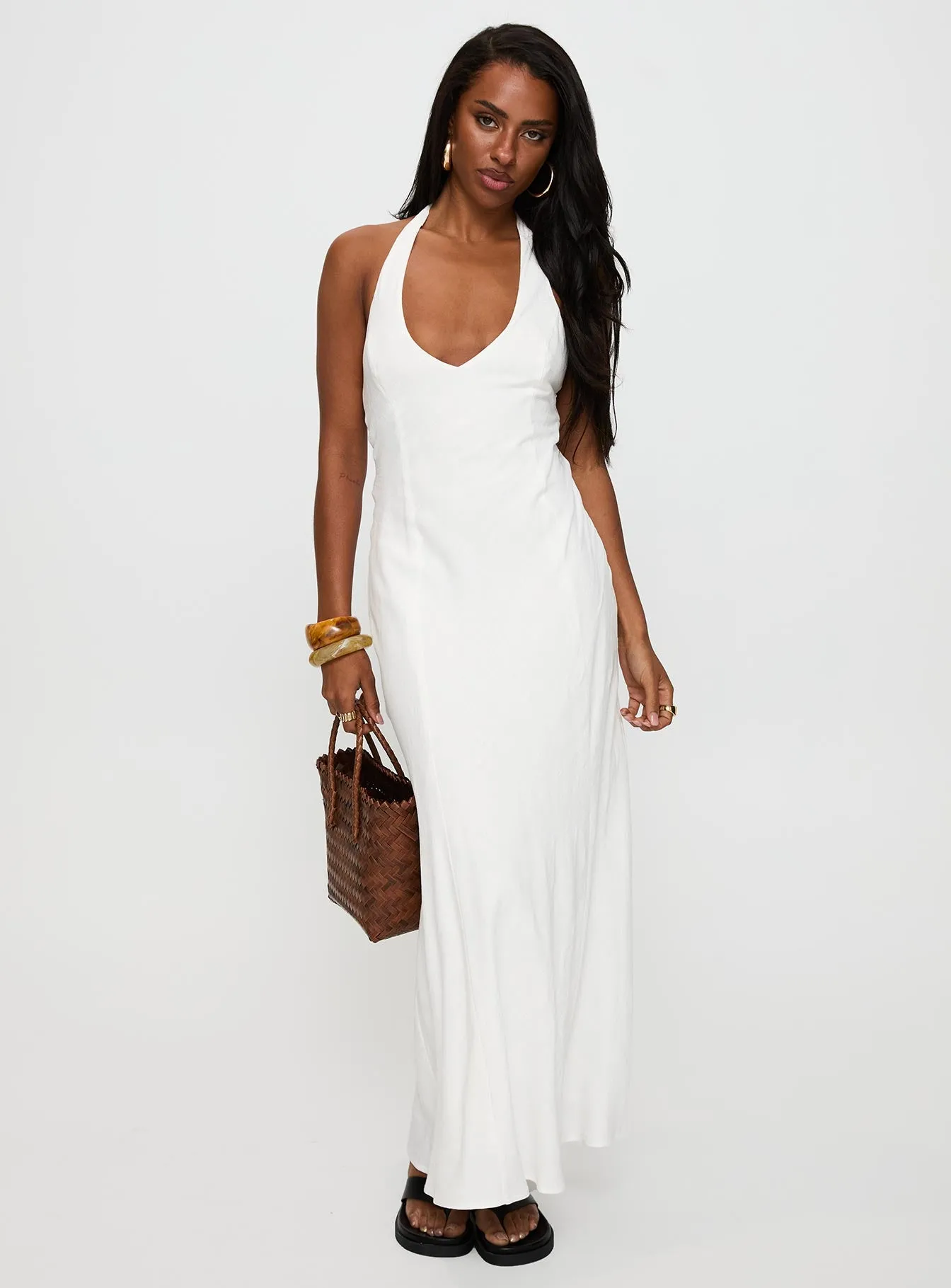 Elegant high-waist gown The flowing nature of this dress provides a relaxed fit while still looking elegant Salone Linen Halter Maxi Dress White