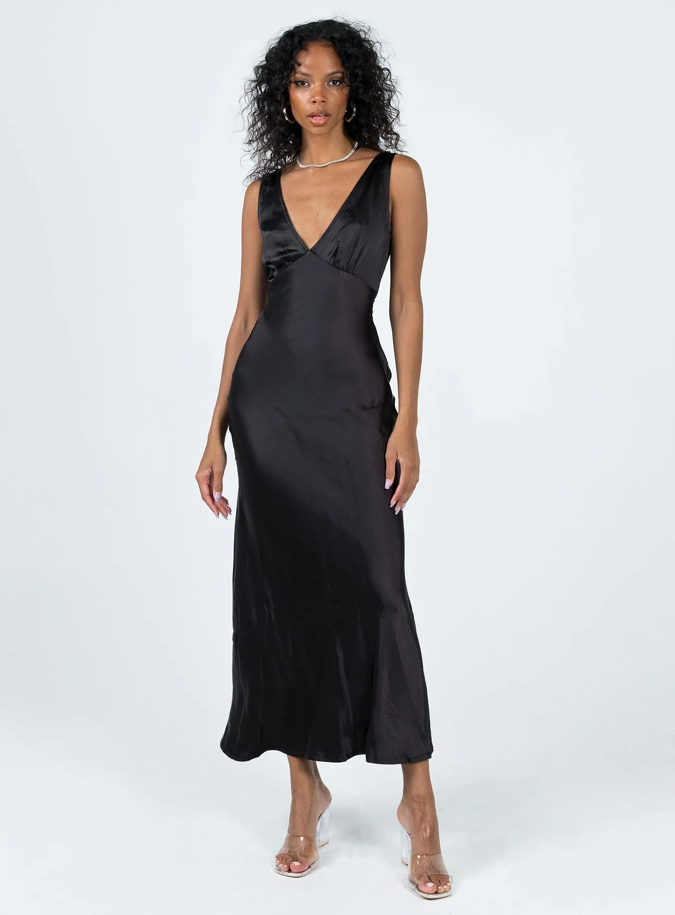 Nellie Maxi Dress Black The sleek lines of this maxi dress create a flattering and elegant look for any event
