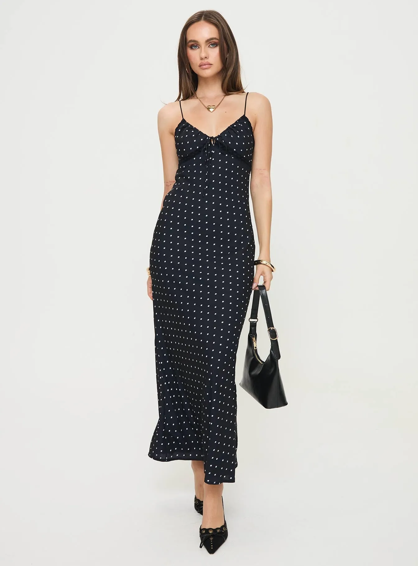 Emily Maxi Dress Black Polka Dot With its soft fabric and elegant cut this dress is perfect for all-day wear