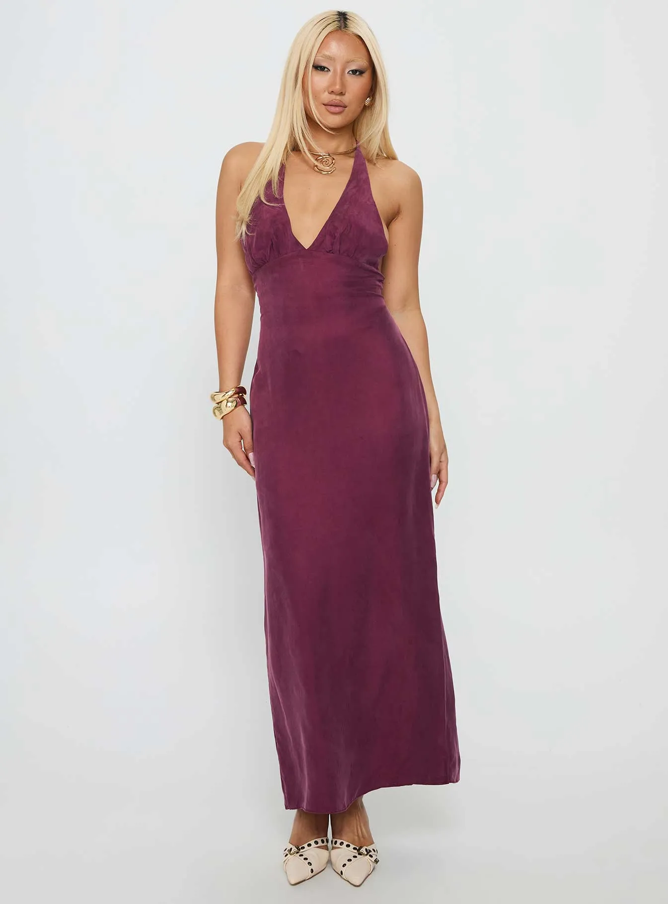 The soft fabric of this dress ensures all-day comfort without compromising on style True Companion Halter Maxi Dress Berry