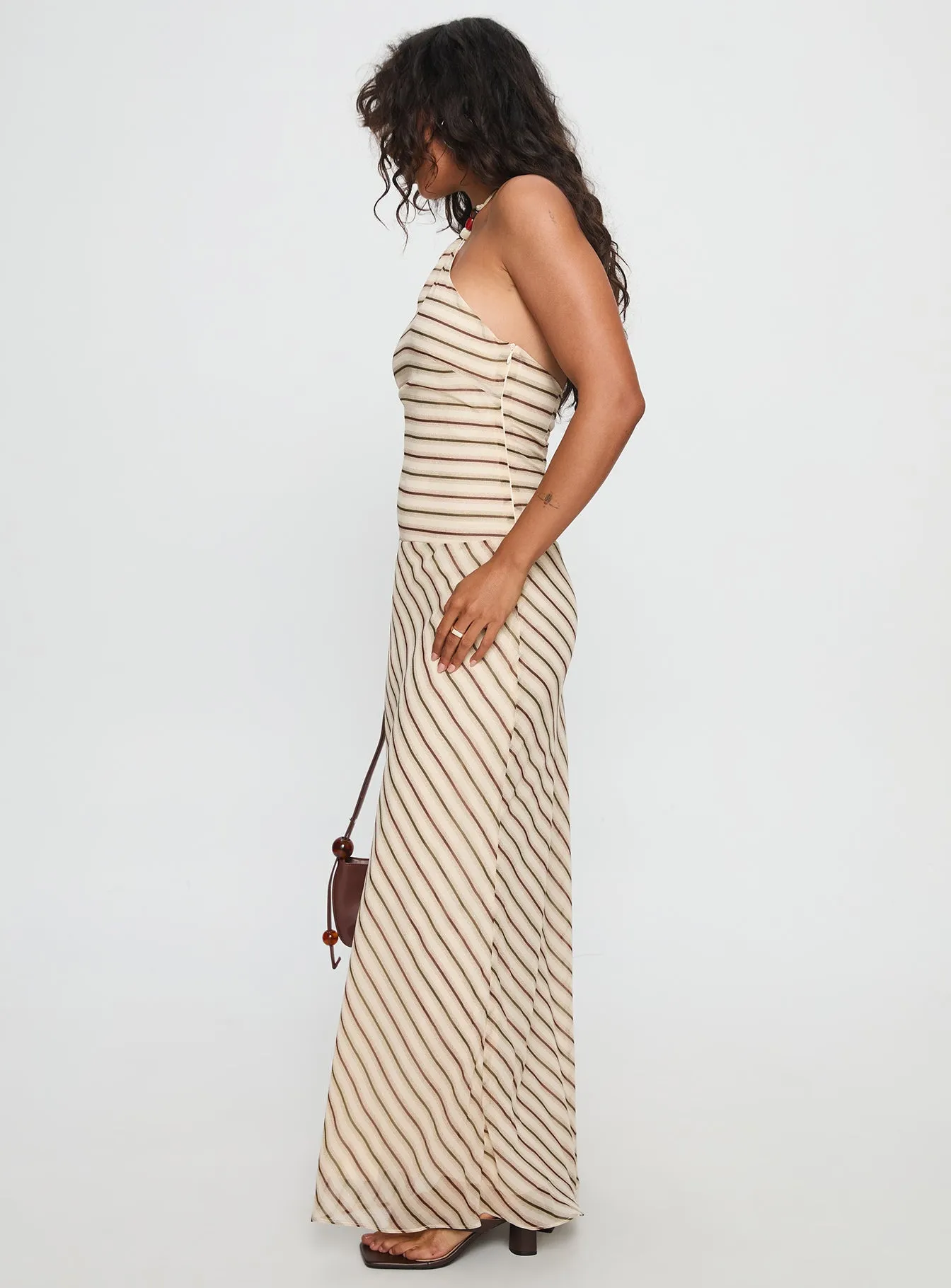 Tropeza Beaded Halter Maxi Dress Multi Stripe This maxi dress offers a comfortable and flattering fit for any occasion