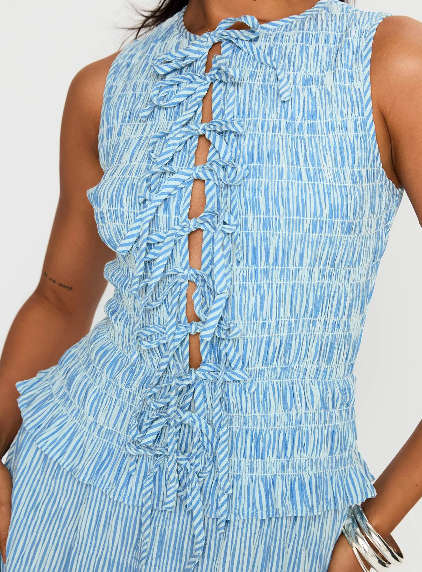 Songbird Shirred Maxi Dress Blue The simple design of this dress ensures that it will never go out of style
