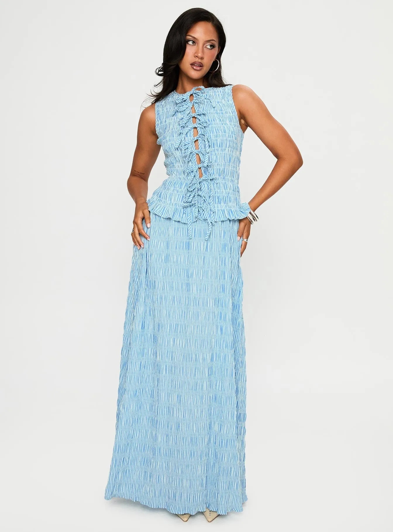 Marina Walk The simple silhouette of this dress makes it easy to style for both day and night wear Songbird Shirred Maxi Dress Blue