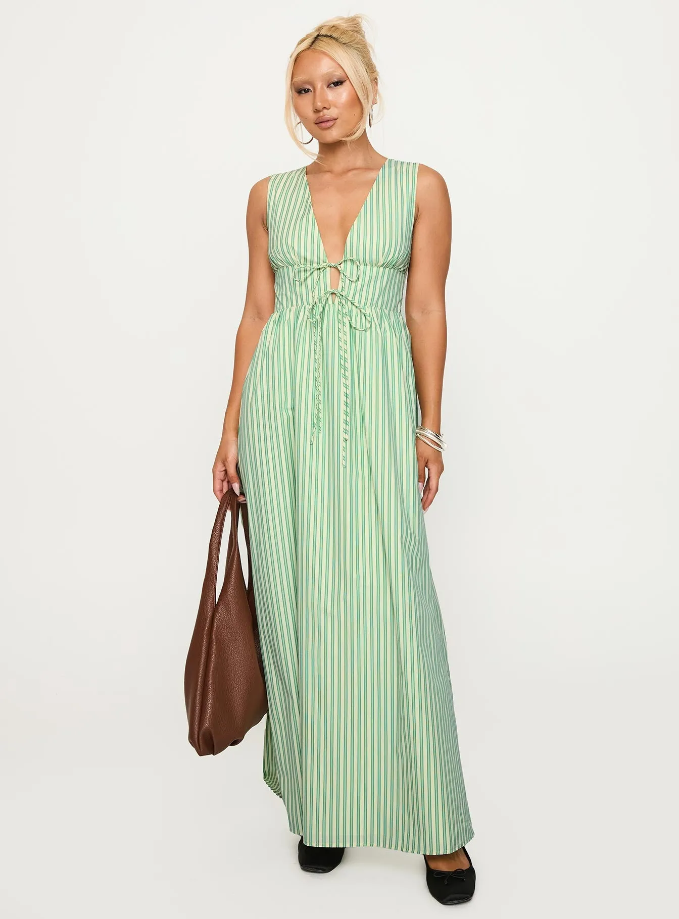 The lightweight fabric of this dress ensures comfort throughout the day without compromising style Pokey Maxi Dress Green Stripe