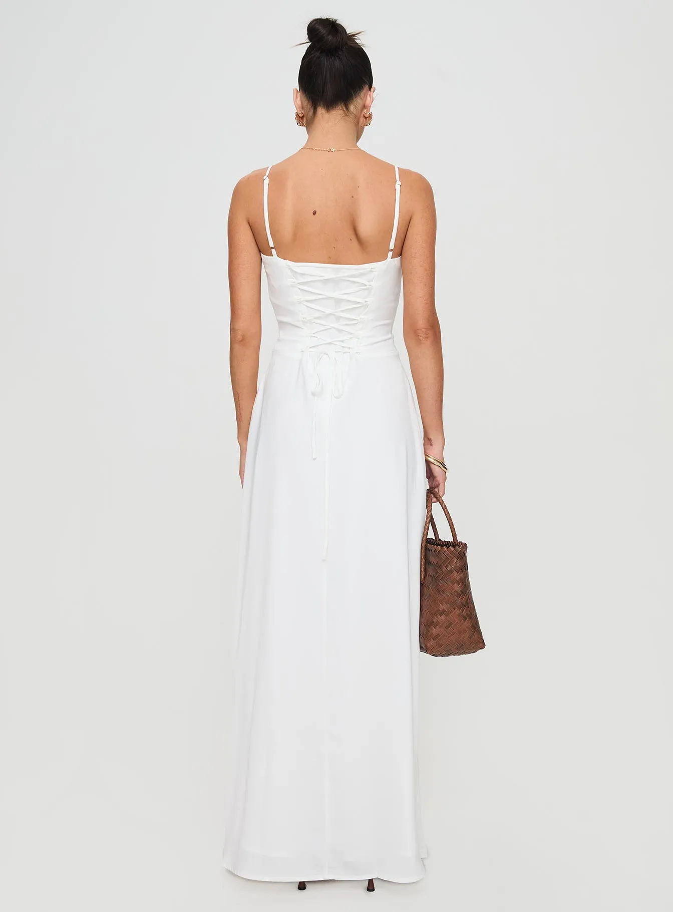 Eleanora Maxi Dress White One shoulder With its comfortable fit this dress is perfect for all-day wear while maintaining an elegant appearance