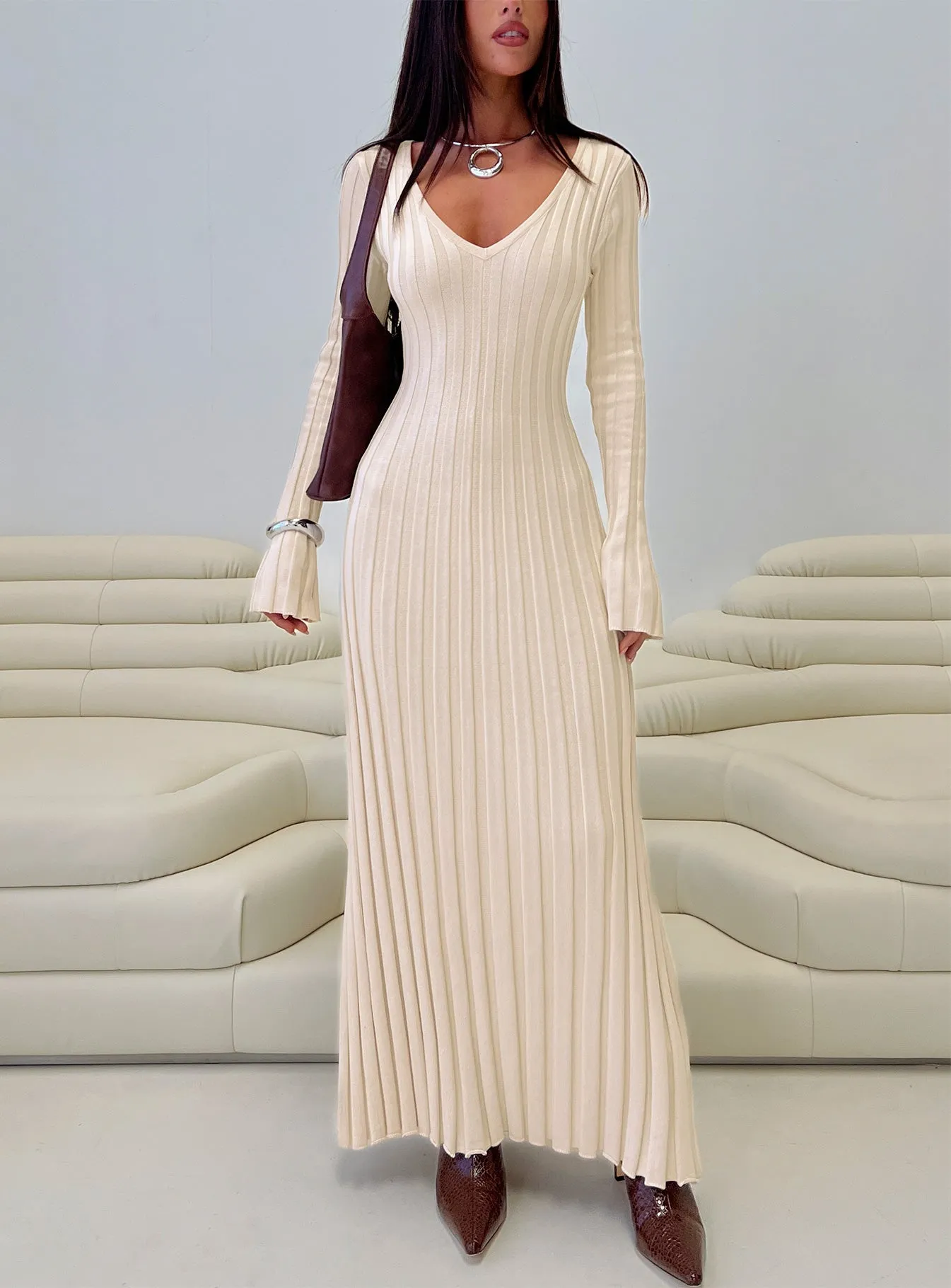 The lightweight fabric of this dress ensures it is breathable and comfortable in any weather Gratuita Long Sleeve Rib Maxi Dress Cream