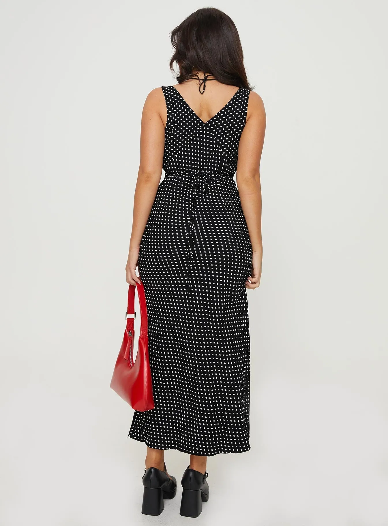 Nellie Maxi Dress Black Polka Dot Petite Its versatile length ensures it can be worn for a variety of occasions from casual to formal Coastal Chic