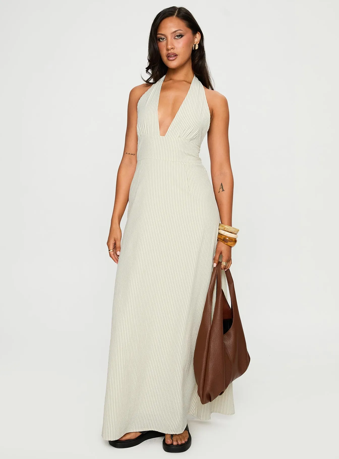 Caralyn Halter Maxi Dress Multi Stripe Grace Flow This dress creates a flattering silhouette while remaining breathable and comfortable