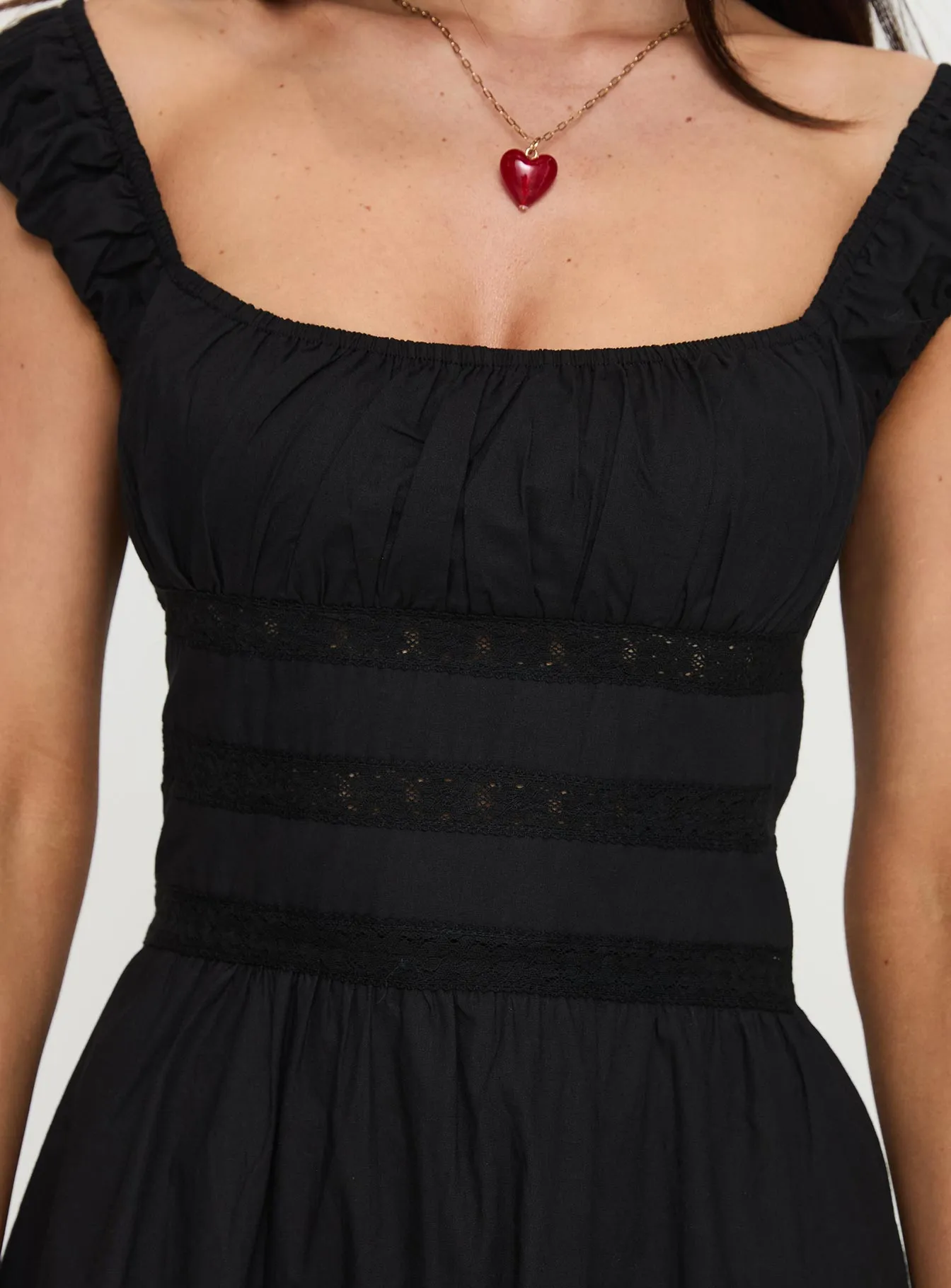 Peonia Lace Mini Dress Black Trendy Silhouette Vibrant color