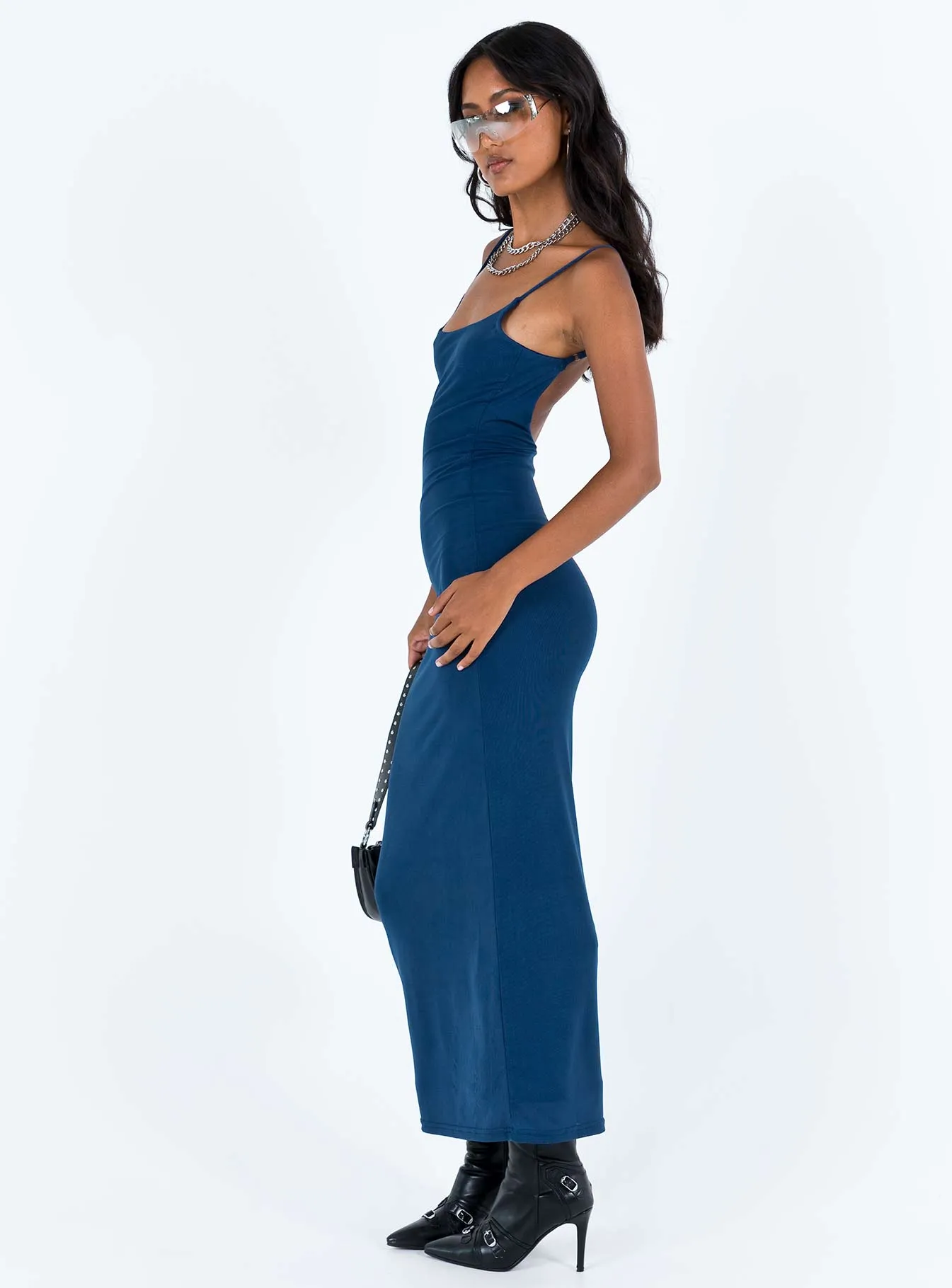 The simple silhouette of this dress makes it easy to style for both day and night wear Pleat Glow Knox Maxi Dress Navy
