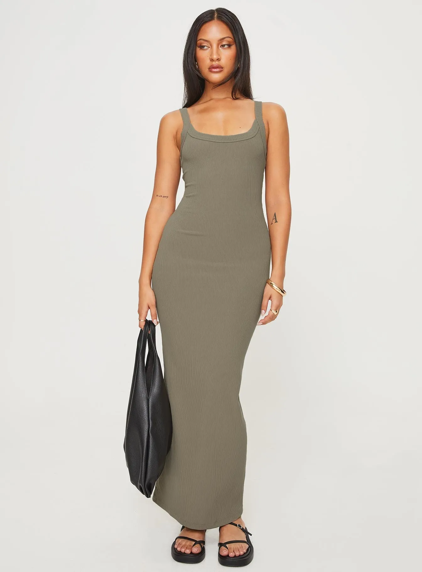 Perfect for layering with jackets or sweaters this maxi dress works for year-round wear Perfect for warmer months this dress provides a light and breezy fit without sacrificing style Montwood Maxi Dress Beige