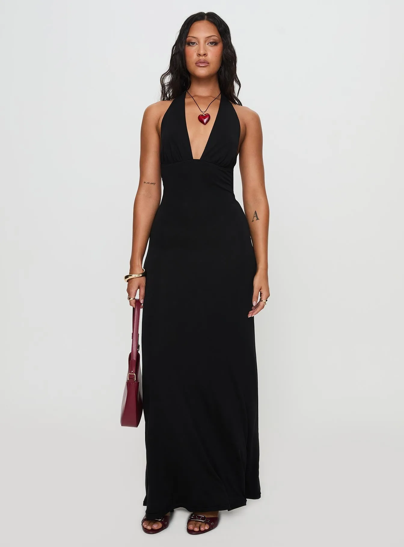 Shimmer Sky This dress is perfect for transitioning between seasons while still maintaining an elegant look Tinisie Maxi Dress Black