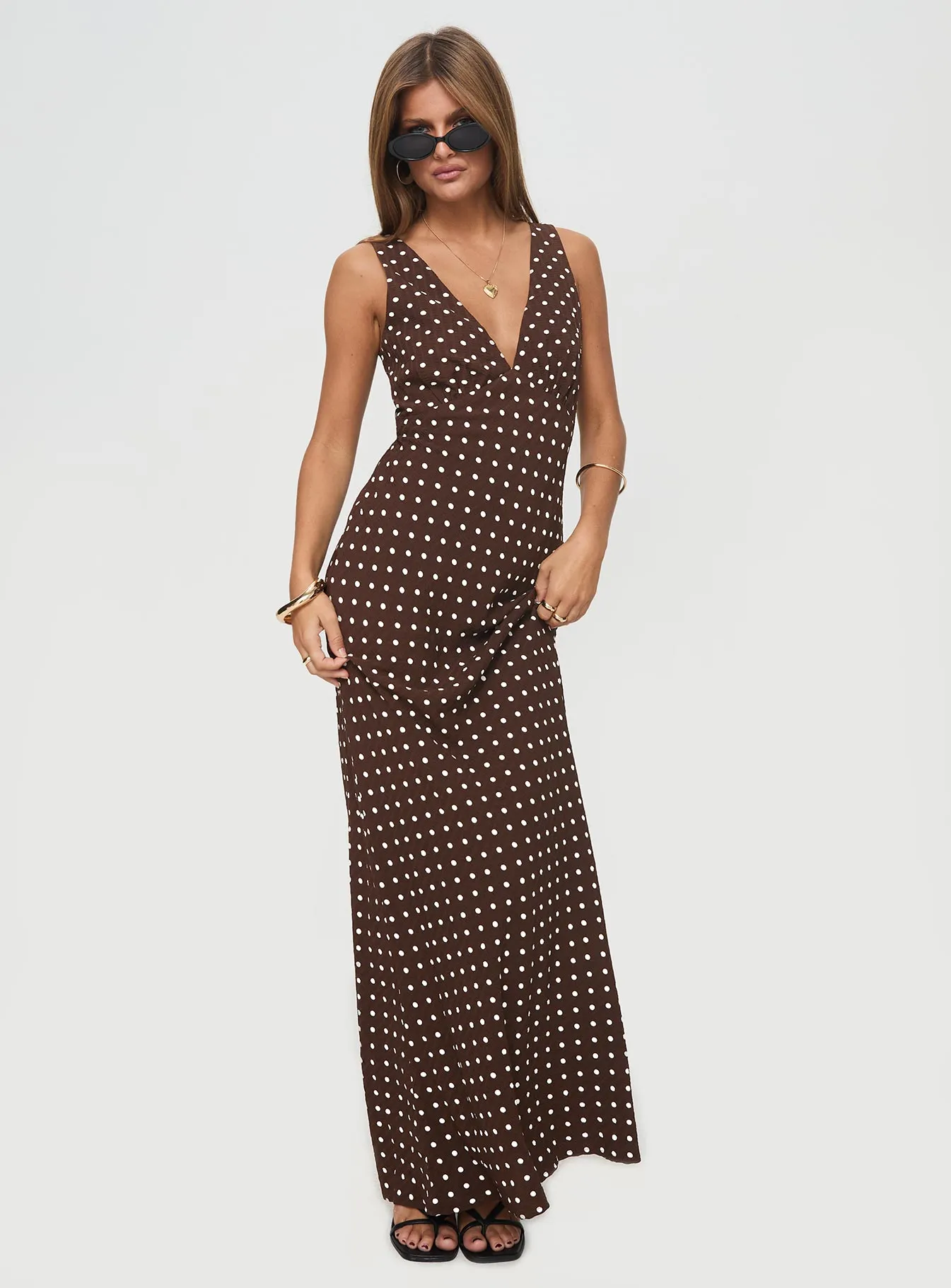 Nellie Maxi Dress Brown Polka Dot The dress??s versatile design allows you to wear it for work, weekend outings, or evening events