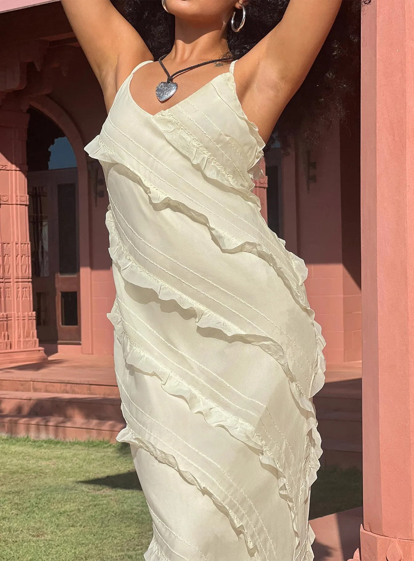 This maxi dress can be worn with a variety of shoes and accessories to create a unique look Shimmer Light Lars Maxi Dress Yellow