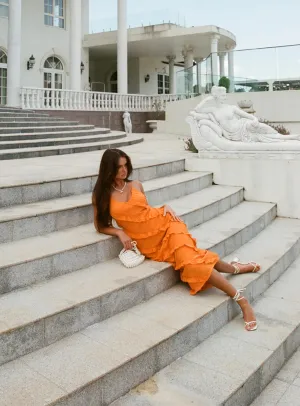 Lars Maxi Dress Orange Designed with a simple yet elegant cut this dress works for both casual and formal occasions Canal Side