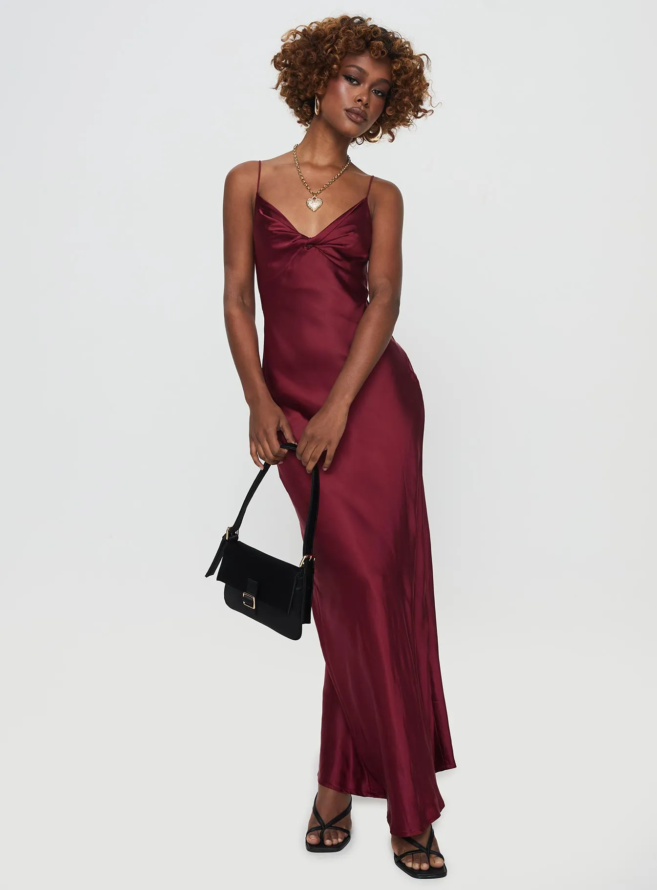 Marilyn Maxi Dress Wine With its elegant design this maxi dress can be styled for a variety of events from casual to formal