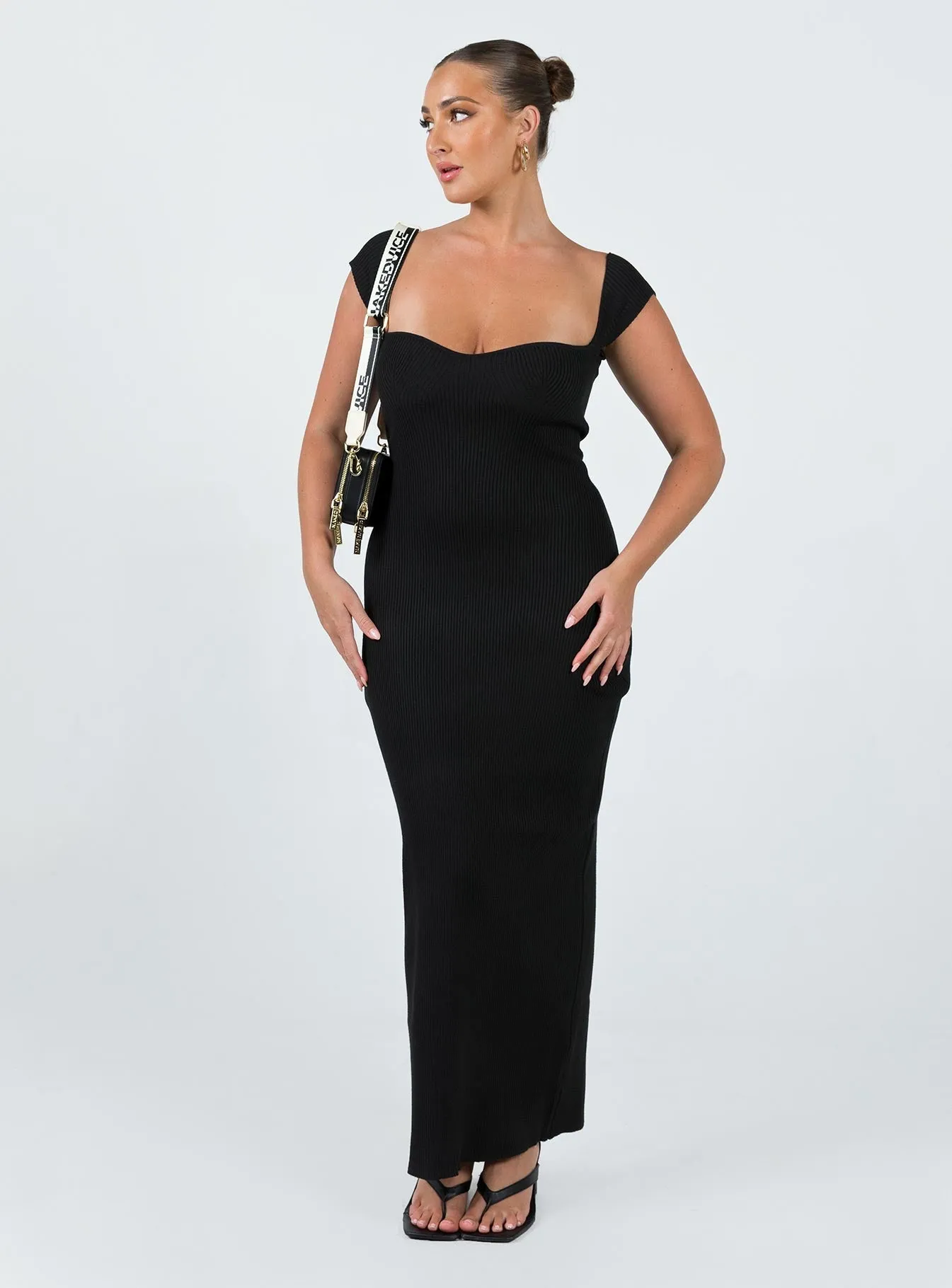 The flattering silhouette of this dress enhances your figure without compromising comfort Soft Dawn Larissa Maxi Dress Black
