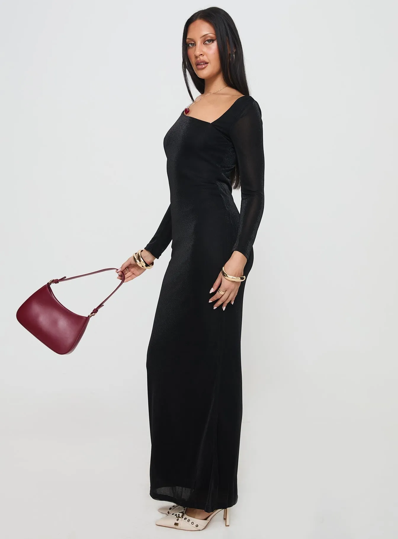 Sedani Long Sleeve Maxi Dress Black This dress is the perfect addition to any wardrobe for those who value both style and comfort poolside style