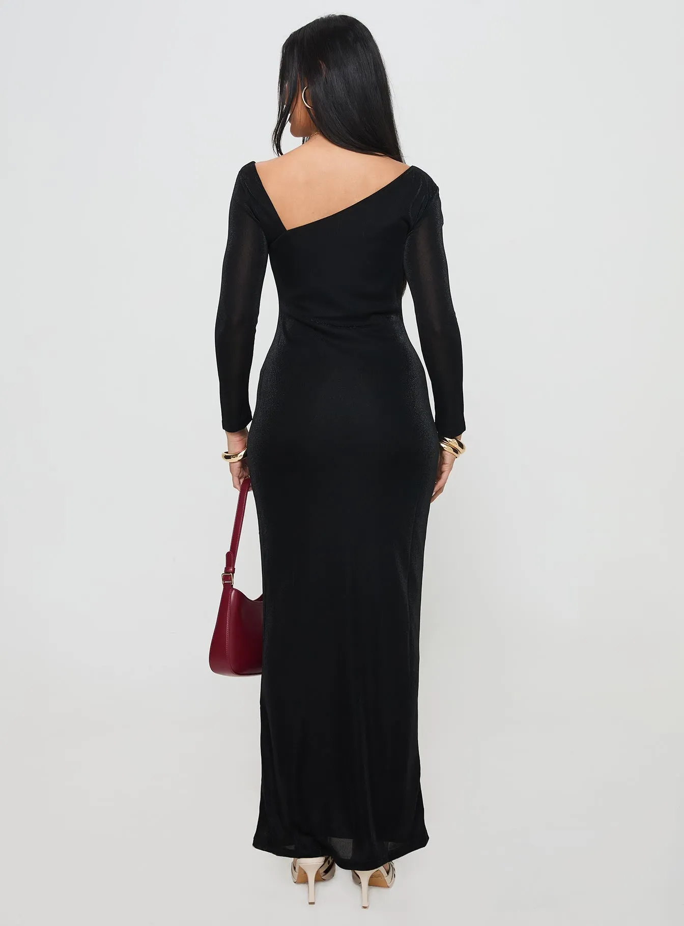 Sedani Long Sleeve Maxi Dress Black This dress provides the perfect blend of comfort and sophistication for any occasion