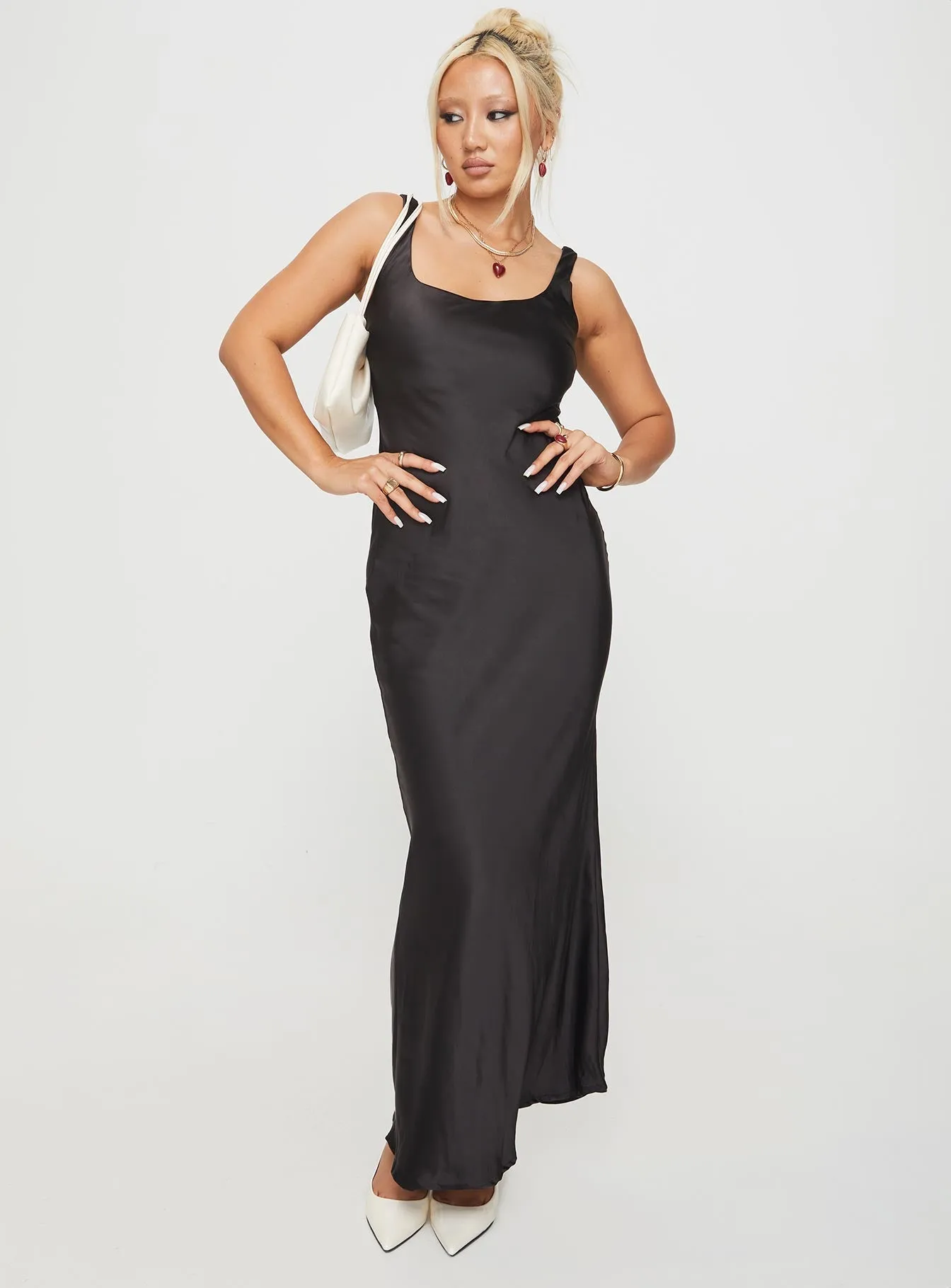 Layer Glow The simple yet stylish design of this maxi dress makes it an ideal choice for any occasion Penelopy Bias Cut Maxi Dress Black