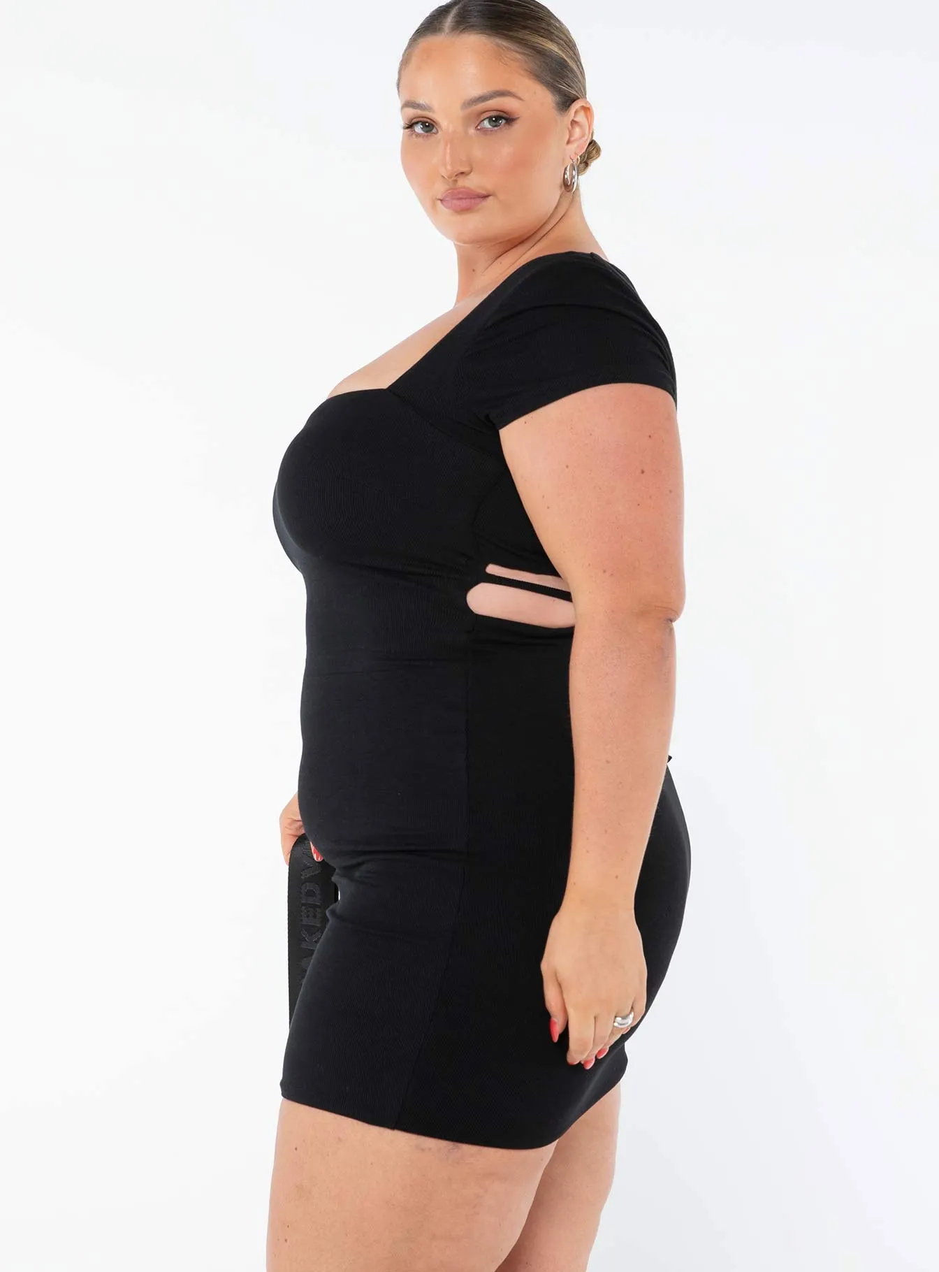 Nolan Short Sleeve Mini Dress Black Curve Short playful dress for vacations