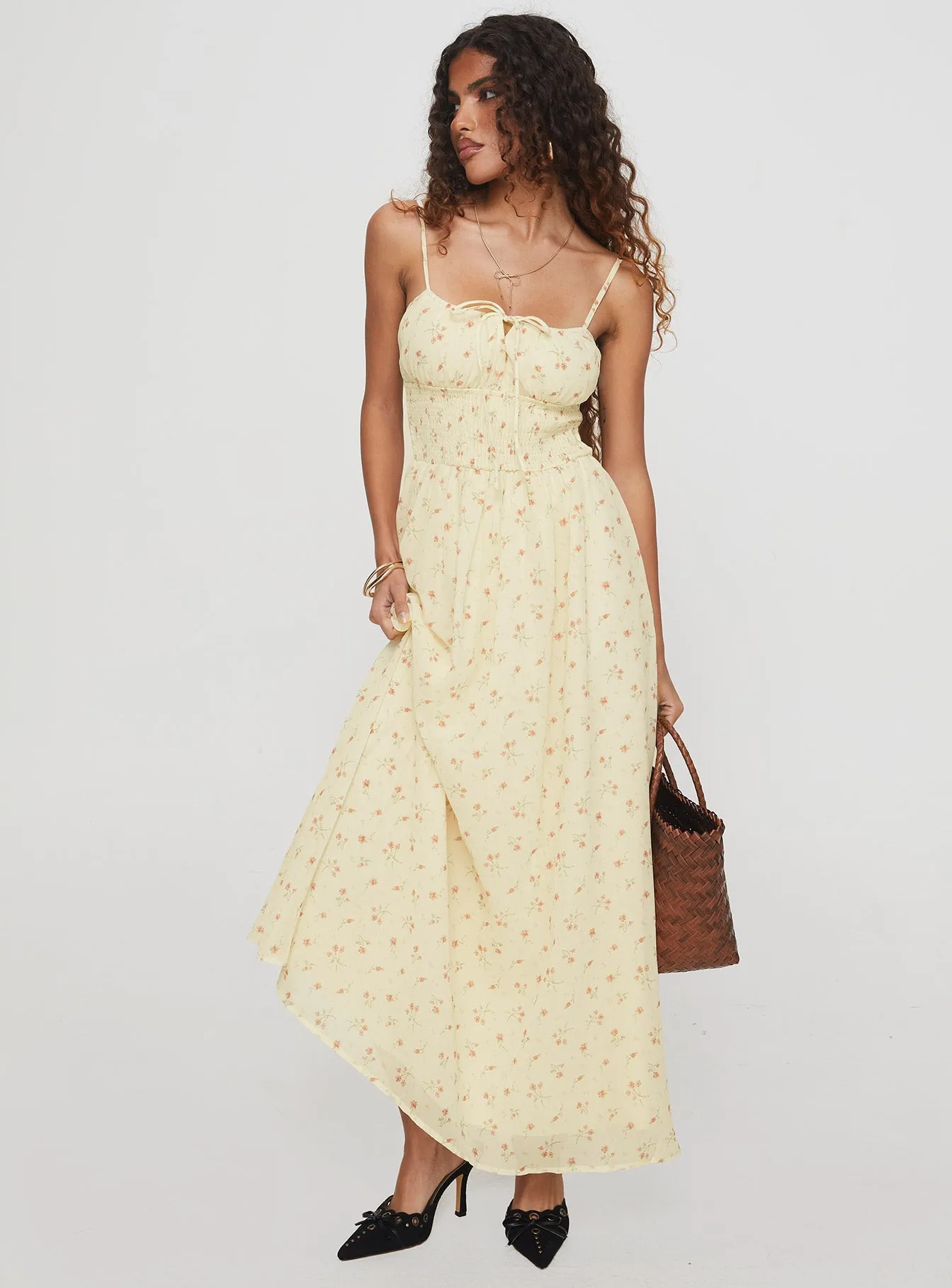 Pearle Shirred Maxi Dress Cream Floral Metal Glow With its comfortable fit this dress is perfect for all-day wear while maintaining an elegant appearance