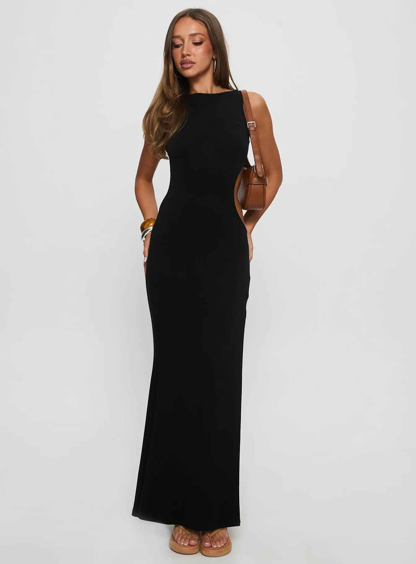 Sorcerer Keyhole Maxi Dress Black This dress is perfect for transitioning between seasons while still maintaining an elegant look This maxi dress combines a relaxed fit with an elegant look for a versatile wardrobe piece