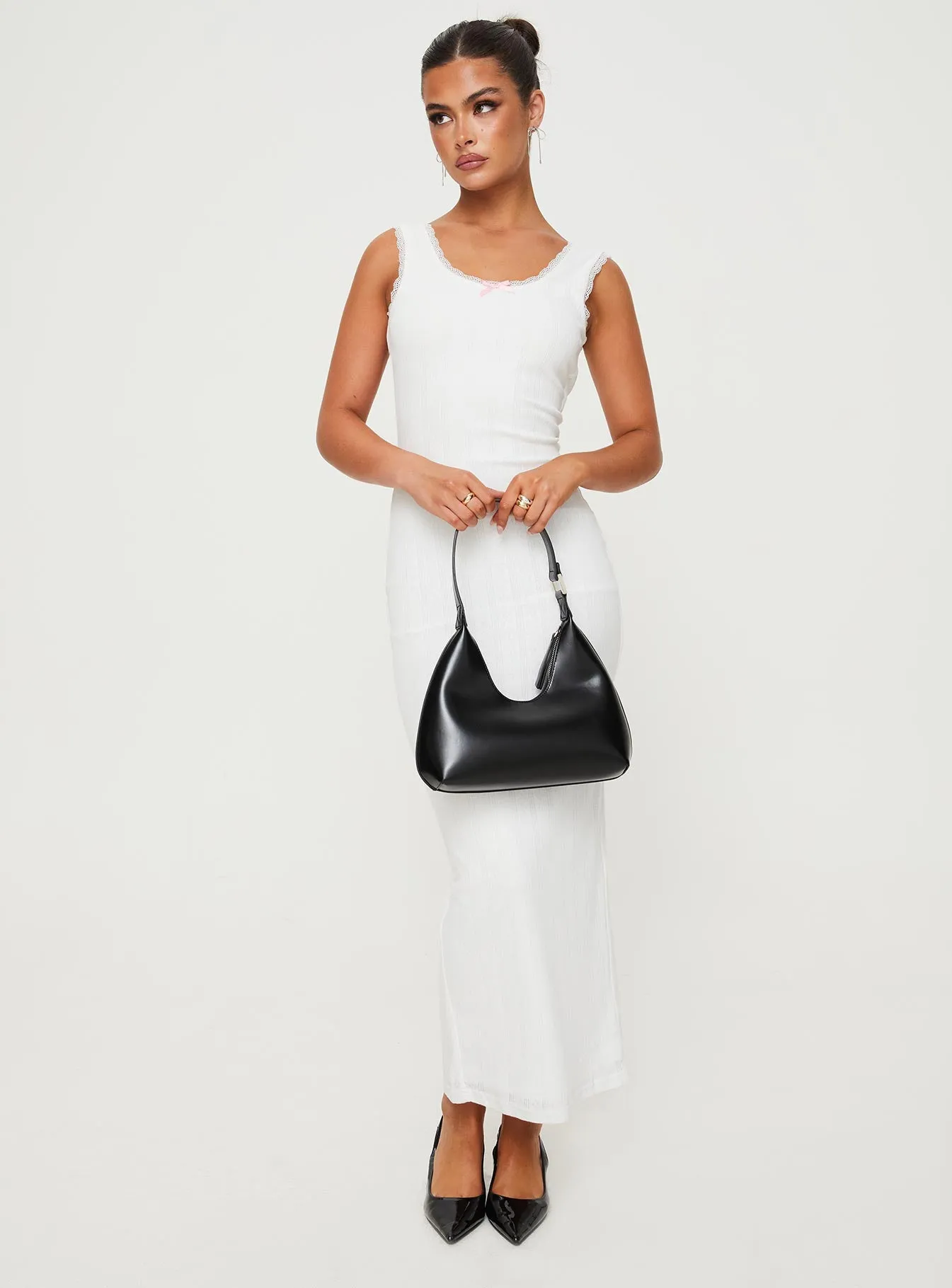 Catania Maxi Dress White The simple yet refined design of this dress makes it easy to pair with different accessories