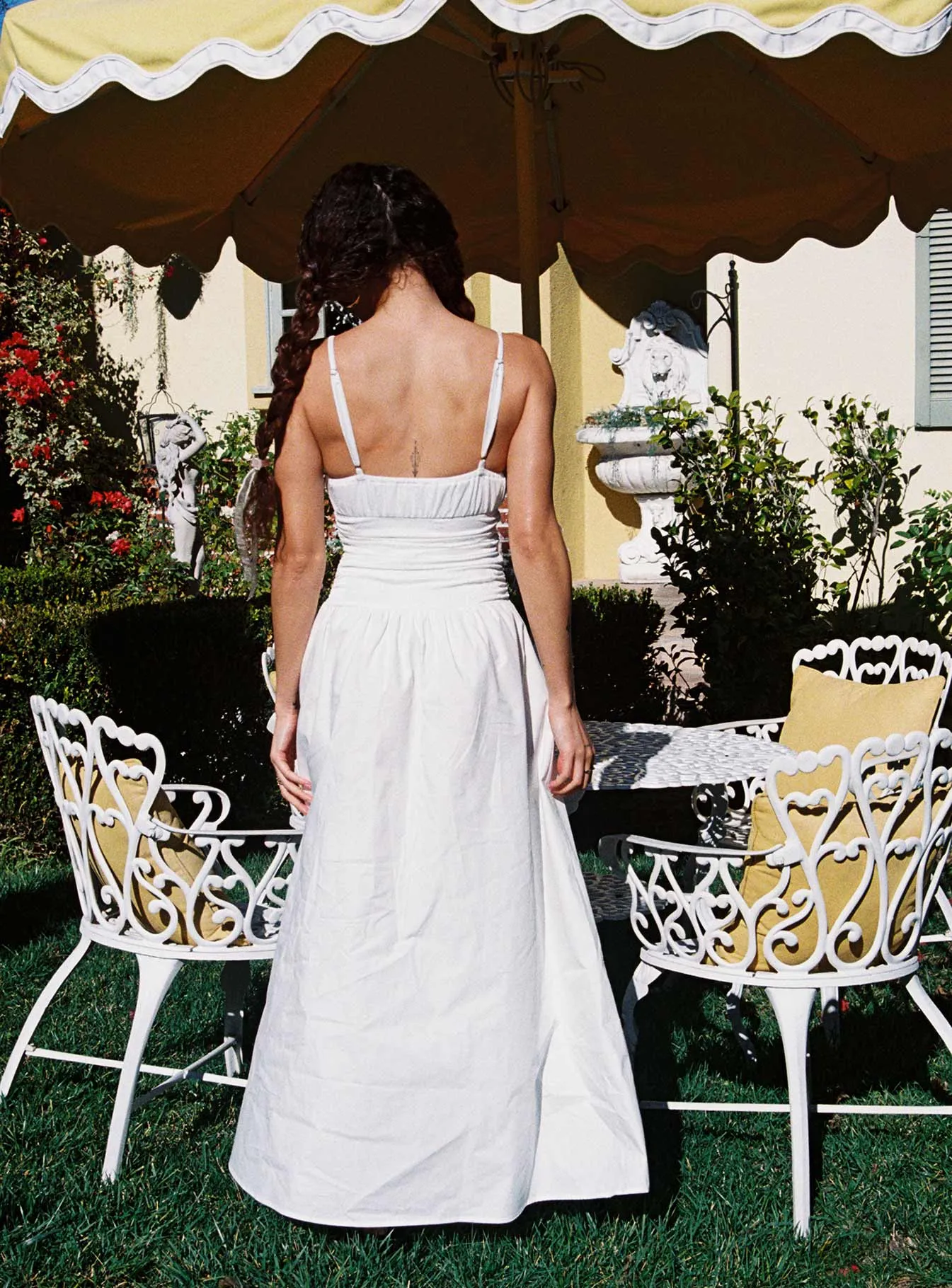Naria Maxi Dress White This dress provides a chic and comfortable fit that works for both formal and casual events